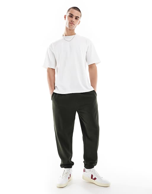 ASOS DESIGN essentials tapered joggers in dark green