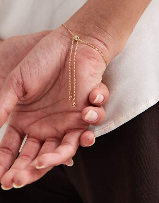 ASOS DESIGN Fine Chain Bracelet With Baguette Cubic Zirconia Stone Details In Gold Tone With Gift Bag