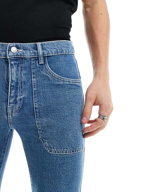 ASOS DESIGN Flare Jeans With Panels In Mid Blue