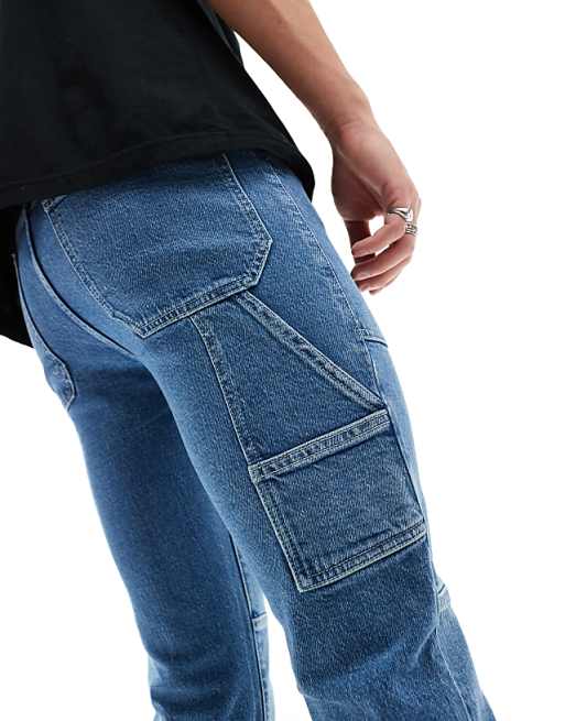 ASOS DESIGN Flare Jeans With Panels In Mid Blue
