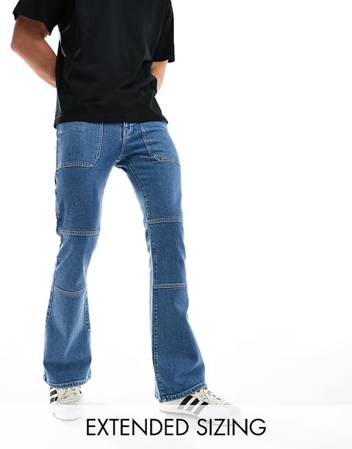 ASOS DESIGN flare jeans with panels in mid blue