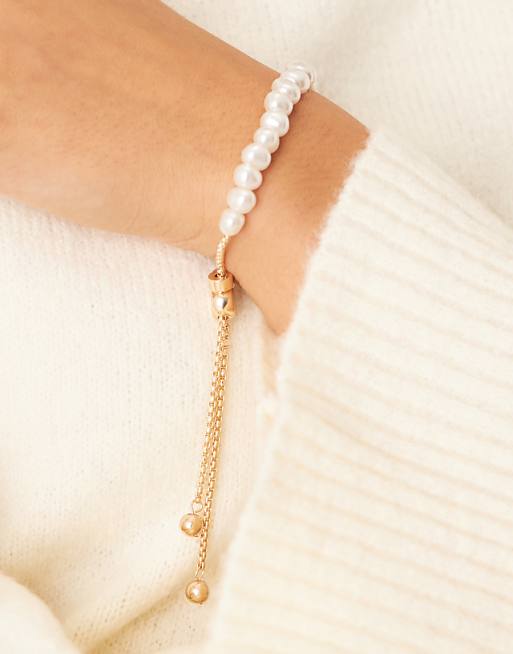 ASOS DESIGN friendship bracelet with faux freshwater pearls in gold tone
