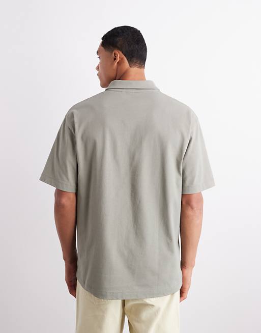 ASOS DESIGN Heavyweight 240gsm Relaxed Fit Polo With Chest Print In Khaki