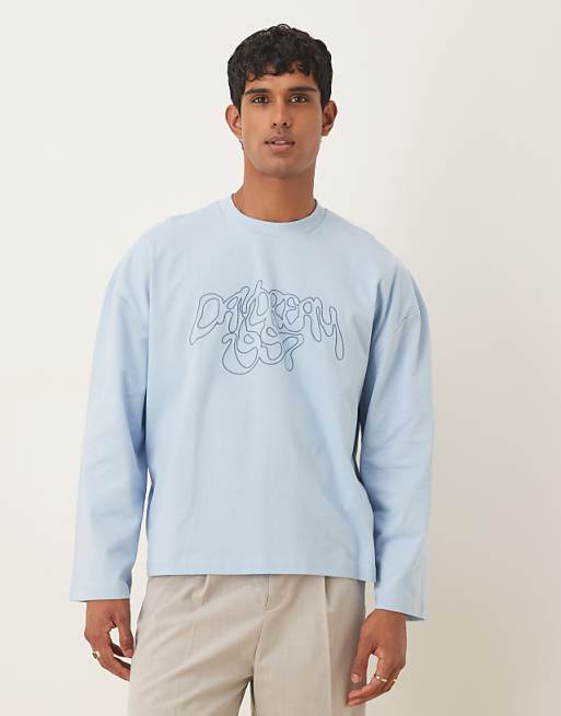 ASOS DESIGN heavyweight boxy oversized long sleeve t-shirt with dropped shoulder and embroidered text in blue