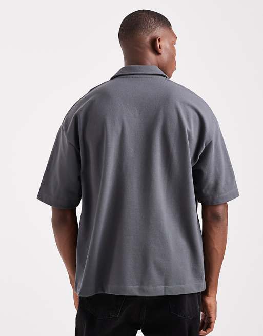 ASOS DESIGN Heavyweight Boxy Oversized Polo With Dropped Shoulder With Chest Logo Embroidery In Charcoal Pique