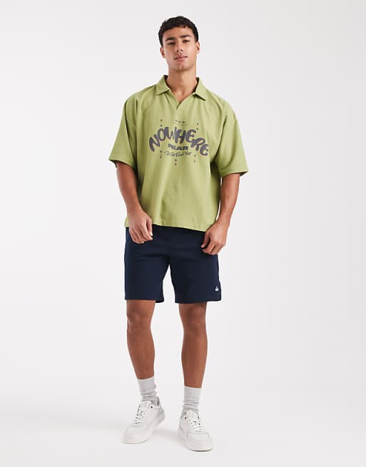 ASOS DESIGN Heavyweight Boxy Oversized Polo With Text Graphic In Green Texture