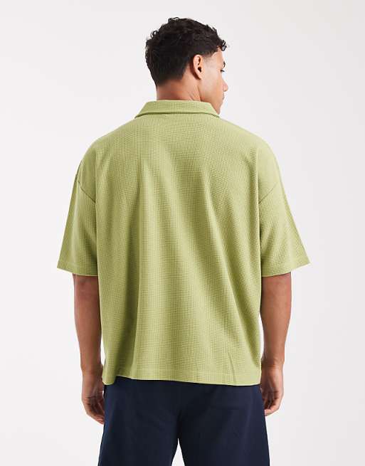 ASOS DESIGN Heavyweight Boxy Oversized Polo With Text Graphic In Green Texture