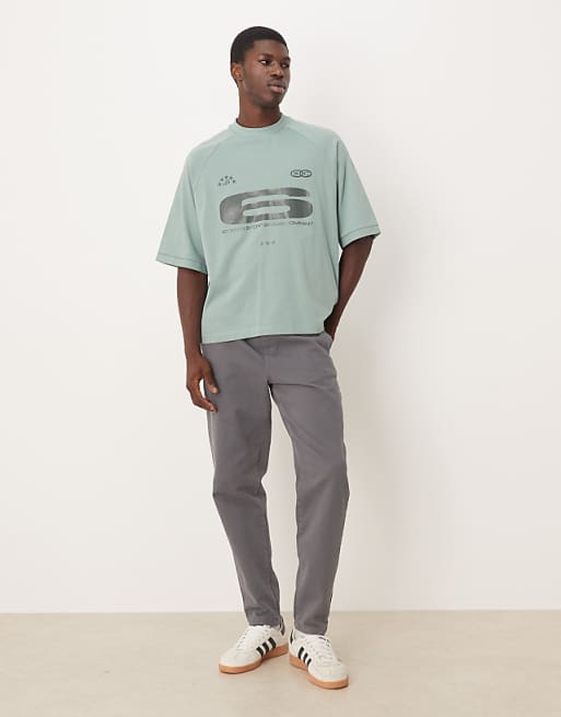 ASOS DESIGN Heavyweight Boxy Oversized Raglan T-shirt With Glossy Sports Graphic In Green