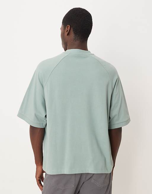 ASOS DESIGN Heavyweight Boxy Oversized Raglan T-shirt With Glossy Sports Graphic In Green