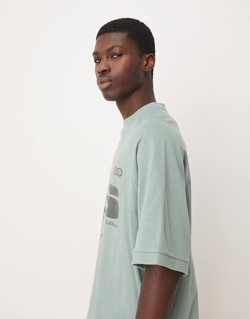 ASOS DESIGN Heavyweight Boxy Oversized Raglan T-shirt With Glossy Sports Graphic In Green