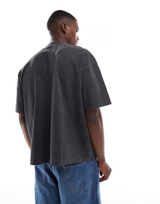 ASOS DESIGN Heavyweight Boxy Oversized T-shirt In Washed Black With Pocket And Sports Graphic