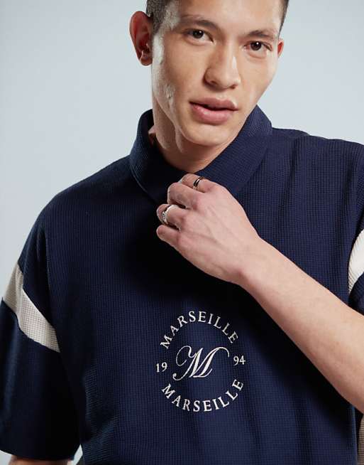 ASOS DESIGN Heavyweight Boxy Waffle Texture Oversized Polo With Panelling And Chest Print In Navy