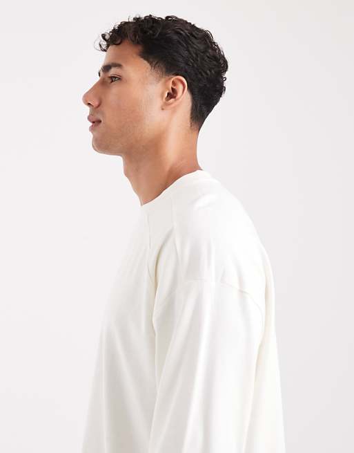 ASOS DESIGN Heavyweight Oversized Long Sleeve T-shirt With Printed Chest Badge And Cut A Sew Detail In Cream
