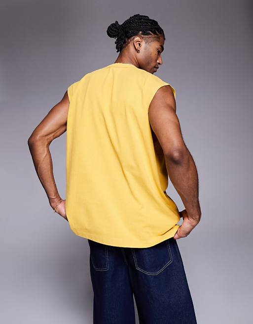 ASOS DESIGN Heavyweight Oversized Tank With Text Graphic In Washed Yellow