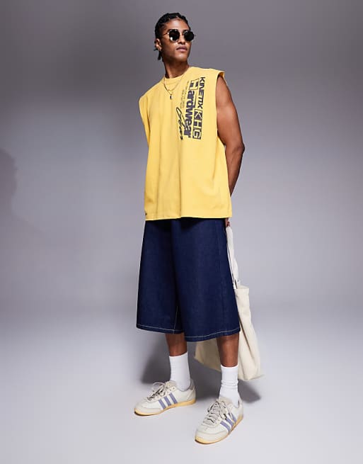 ASOS DESIGN Heavyweight Oversized Tank With Text Graphic In Washed Yellow
