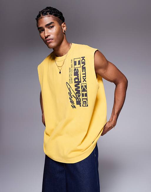 ASOS DESIGN heavyweight oversized tank with text graphic in washed yellow
