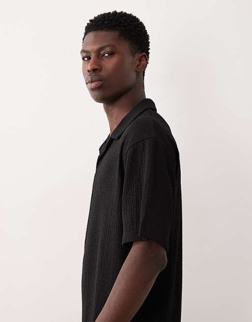 ASOS DESIGN Heavyweight Relaxed Polo In Black Crinkled Rib
