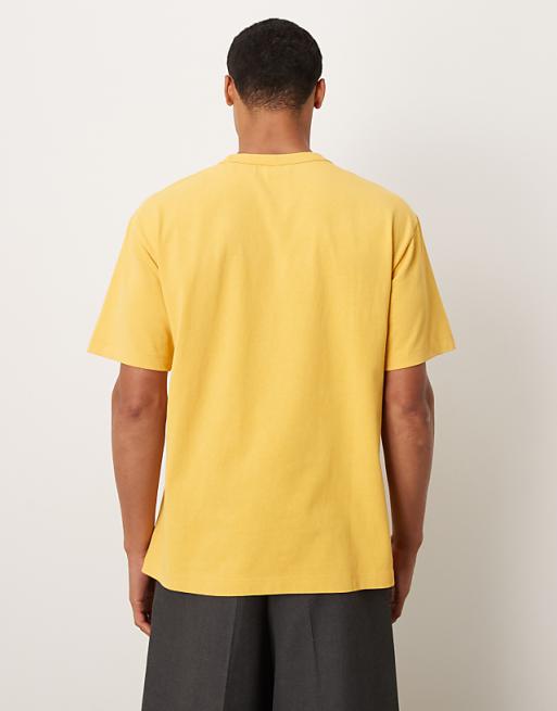 ASOS DESIGN Heavyweight Relaxed T-shirt With NYC Graphic In Washed Yellow