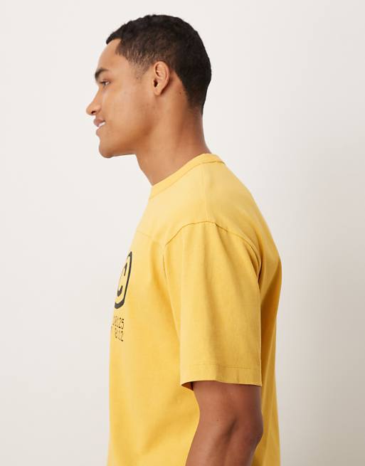 ASOS DESIGN Heavyweight Relaxed T-shirt With NYC Graphic In Washed Yellow