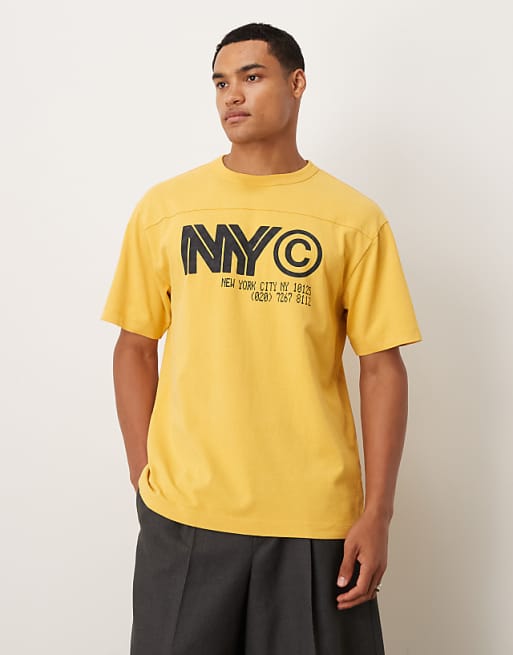 ASOS DESIGN heavyweight relaxed t-shirt with NYC graphic in washed yellow