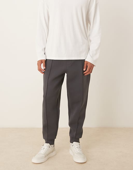 ASOS DESIGN heavyweight tapered joggers in scuba-style fabric with pin tucks in charcoal