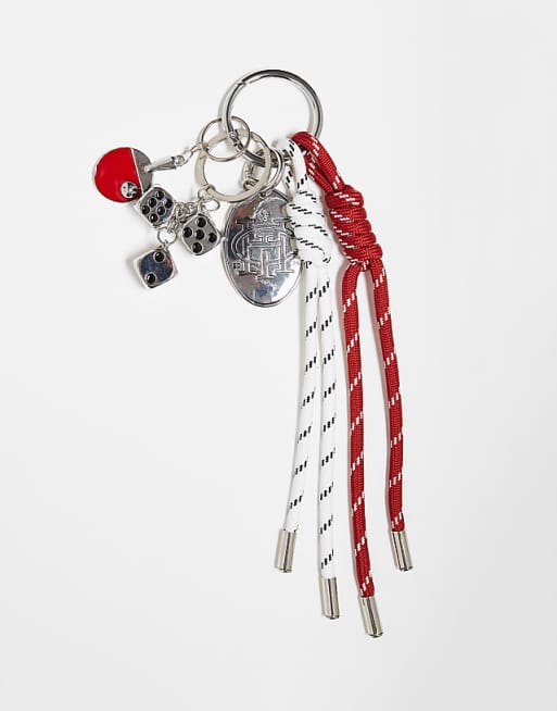 ASOS DESIGN keyring bag charm in red cord with table tennis charm in multi