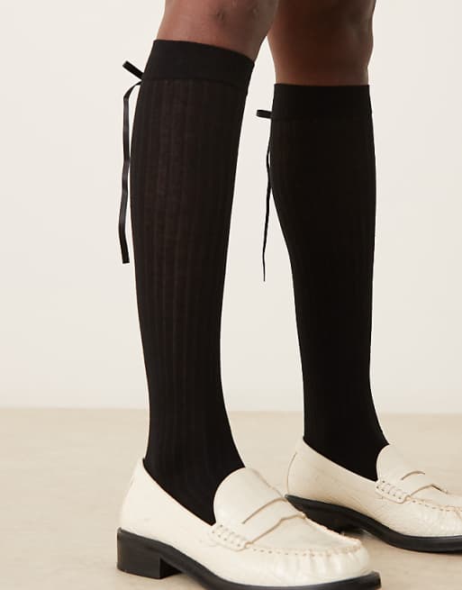 ASOS DESIGN knee high socks in black with ribbon
