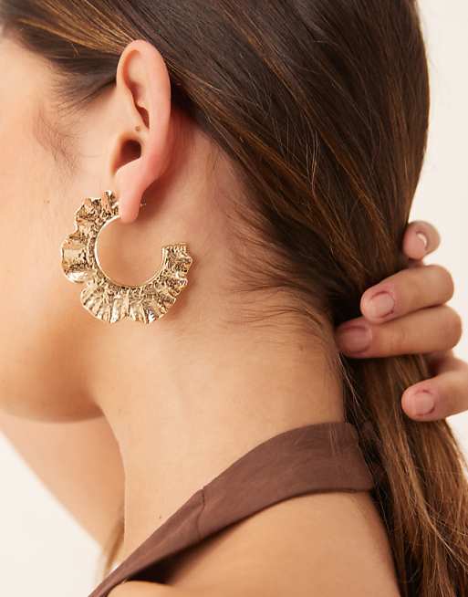 ASOS DESIGN large hoop earrings with hammered floral shape in gold tone