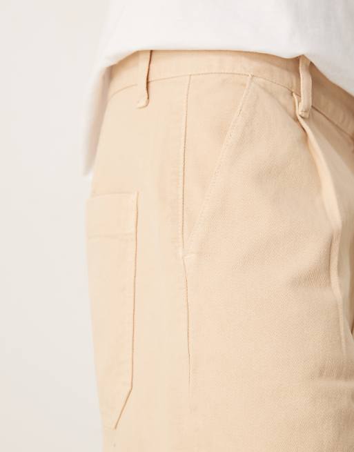 ASOS DESIGN Long Length Pleated Shorts In Beige