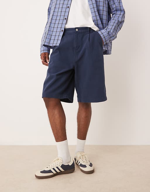 ASOS DESIGN long length pleated shorts in navy