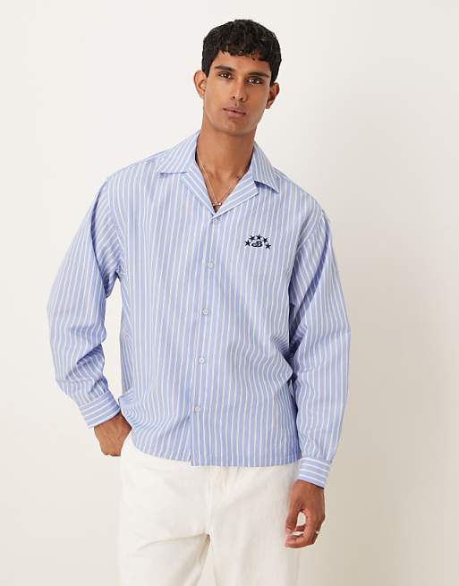 ASOS DESIGN long sleeved oversized fit shirt with embroidery detail in blue and white stripe cotton