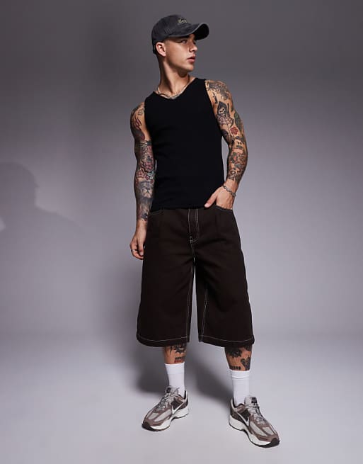 ASOS DESIGN longer length contrast stitch shorts in brown with pleats