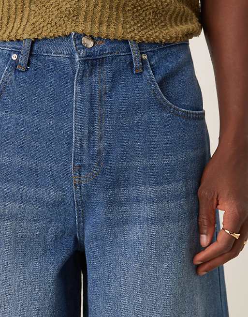ASOS DESIGN Longer Length Denim Jort In Mid Wash Blue