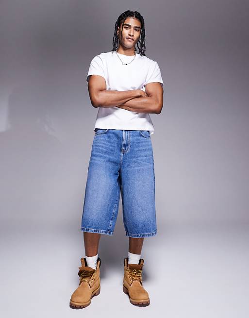 ASOS DESIGN longer length denim jort in mid wash blue