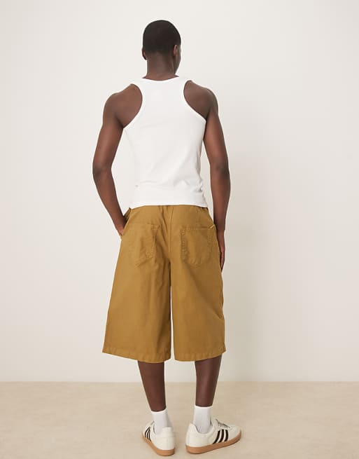 ASOS DESIGN Longer Length Shorts With Belt And Pleats In Olive Green