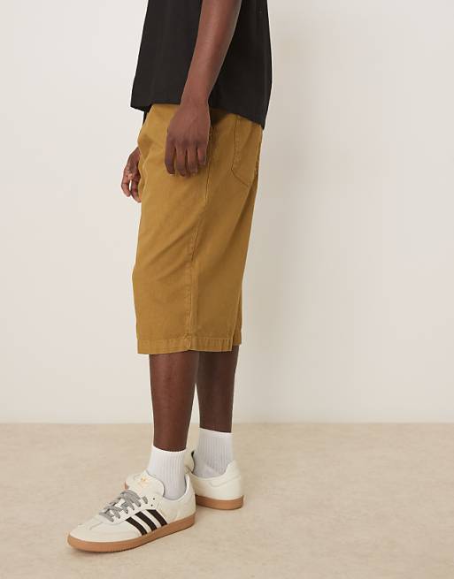 ASOS DESIGN Longer Length Shorts With Belt And Pleats In Olive Green