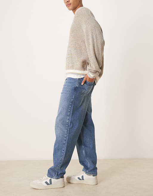 ASOS DESIGN Loose Straight Fit Jeans In Midwash Blue With Raw Hem Styling