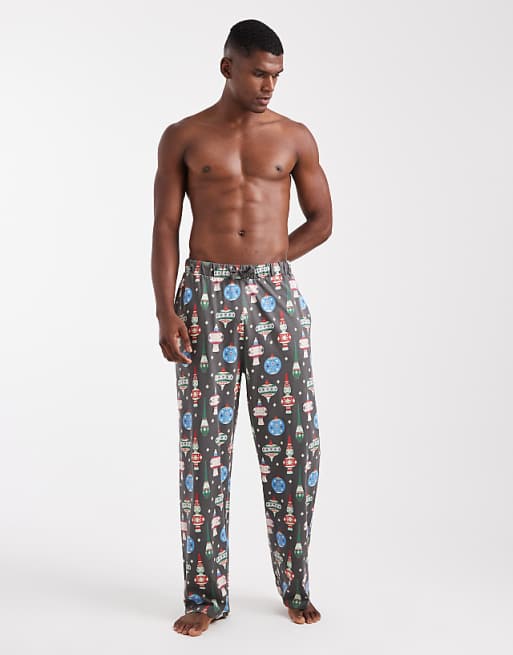ASOS DESIGN lounge bottoms with Christmas bauble graphic in black