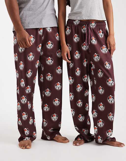 ASOS DESIGN Lounge Bottoms With Disney's Christmas Mickey Mouse Graphic In Burgundy