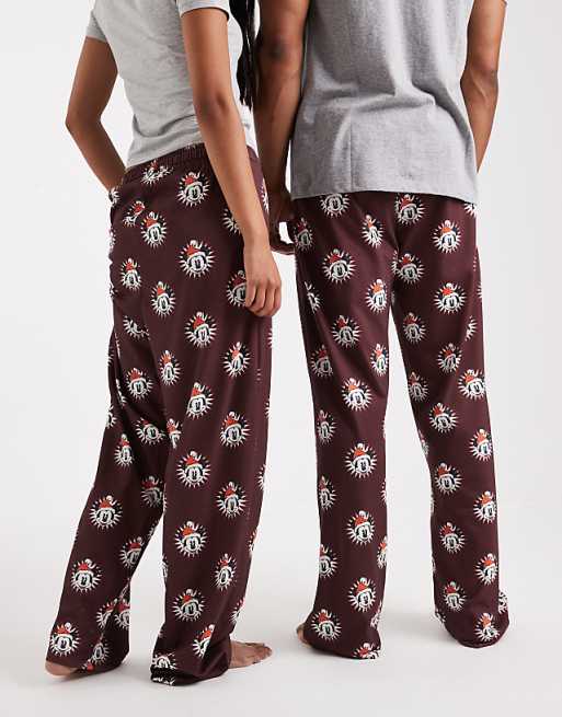 ASOS DESIGN Lounge Bottoms With Disney's Christmas Mickey Mouse Graphic In Burgundy