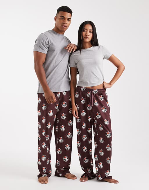 ASOS DESIGN lounge bottoms with Disney's Christmas Mickey Mouse graphic in burgundy