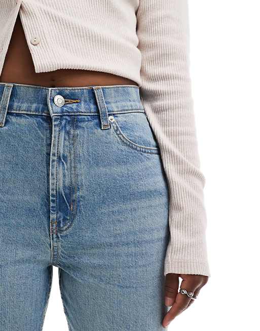 ASOS DESIGN Mid Rise Flare Jeans In Light Vintage Wash