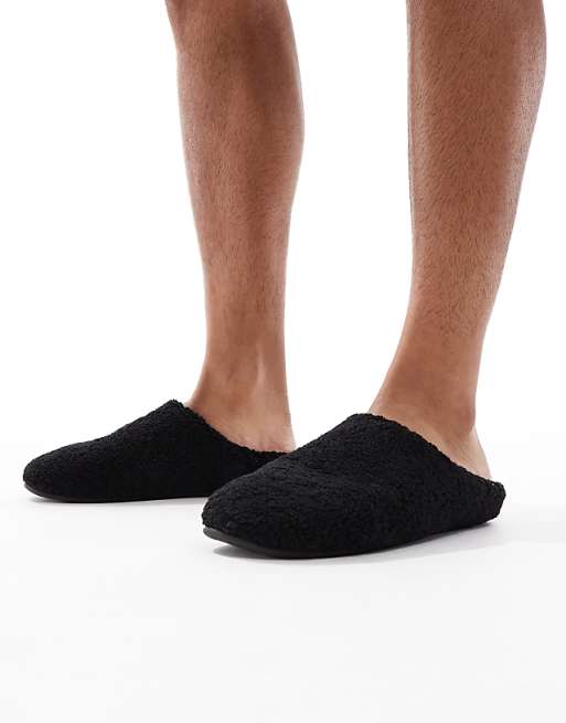 ASOS DESIGN mule slippers in black borg