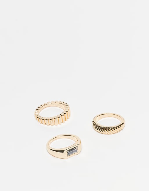 ASOS DESIGN multi-pack of rings with horizontal signet stone-set and ridged design in gold tone