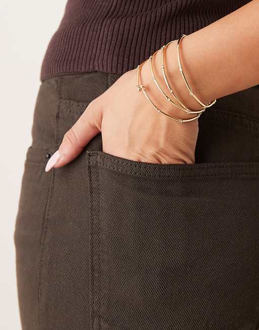 ASOS DESIGN multi-row stretch bracelets in gold tone