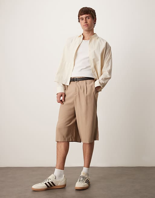 ASOS DESIGN oversized bemuda shorts with pleat details in sand