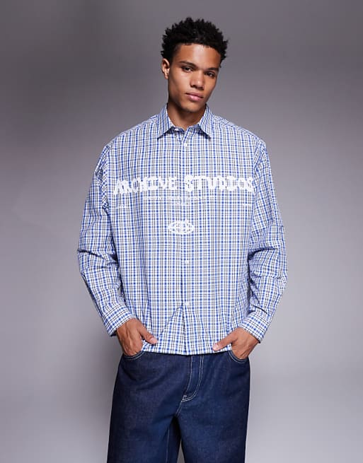 ASOS DESIGN oversized check shirt with chest print in blue