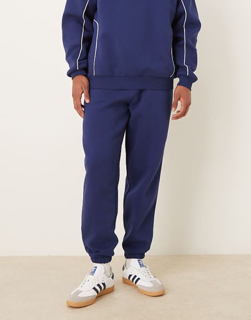 ASOS DESIGN oversized jogger with piping in blue