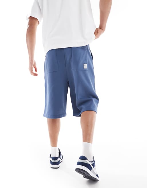 ASOS DESIGN Oversized Long Length Short In Washed Blue