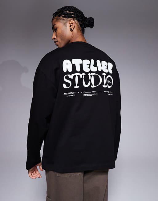 ASOS DESIGN oversized long sleeve t-shirt with atelier studio graphic in black